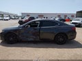 2015 Acura TLX — photo 14 of 16 | VIN 19UUB2F59FA015742