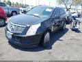 2013 Cadillac SRX — photo 2 of 15 | VIN 3GYFNCE32DS606716