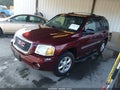 2003 GMC Envoy — photo 2 of 12 | VIN 1GKDS13S332199072
