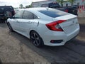 2016 Honda Civic — photo 3 of 16 | VIN 19XFC1F92GE037176
