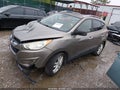 2011 Hyundai Tucson — photo 2 of 15 | VIN KM8JU3AC9BU169864
