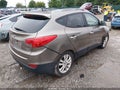 2011 Hyundai Tucson — photo 4 of 15 | VIN KM8JU3AC9BU169864