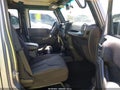 2014 Jeep Wrangler Unlimited — photo 5 of 16 | VIN 1C4BJWDG5EL208946