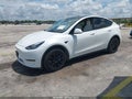 2020 Tesla Model Y — photo 2 of 18 | VIN 5YJYGDEE9LF037158