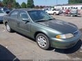 1999 Mazda 626 — photo 13 of 16 | VIN 1YVGF22E8X5882700