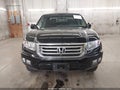 2014 Honda Ridgeline — photo 12 of 16 | VIN 5FPYK1F53EB003562