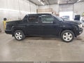 2014 Honda Ridgeline — photo 13 of 16 | VIN 5FPYK1F53EB003562