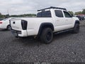 2017 Toyota Tacoma — photo 4 of 16 | VIN 3TMAZ5CN8HM050345