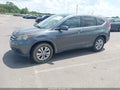 2014 Honda CR-V — photo 2 of 17 | VIN 3CZRM3H52EG703500