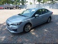 2017 Subaru Impreza — photo 2 of 16 | VIN 4S3GKAD64H3626948