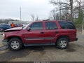 2004 Chevrolet Tahoe — photo 13 of 15 | VIN 1GNEK13Z54J270073
