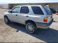 1998 Isuzu Rodeo — photo 3 of 11 | VIN 4S2CK58D3W4324674