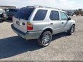 1998 Isuzu Rodeo — photo 4 of 11 | VIN 4S2CK58D3W4324674