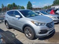 2017 Hyundai Santa Fe — photo 13 of 16 | VIN 5XYZT3LB0HG435099