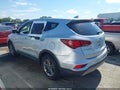 2017 Hyundai Santa Fe — photo 14 of 16 | VIN 5XYZT3LB0HG435099