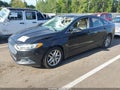 2014 Ford Fusion — photo 2 of 11 | VIN 3FA6P0HD4ER246141