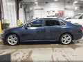 2014 Volkswagen Passat — photo 14 of 16 | VIN 1VWBS7A36EC115922