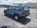 1999 Jeep Cherokee — photo 3 of 16 | VIN 1J4FT28SXXL672430
