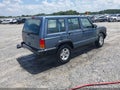 1999 Jeep Cherokee — photo 4 of 16 | VIN 1J4FT28SXXL672430