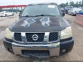 2006 Nissan Titan — photo 13 of 22 | VIN 1N6BA07BX6N575647