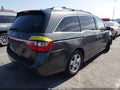 2011 Honda Odyssey — photo 4 of 16 | VIN 5FNRL5H94BB020013