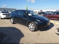 2024 Tesla Model Y — photo 1 of 20 | VIN 7SAYGDED3RF048448