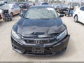 2018 Honda Civic — photo 13 of 21 | VIN 2HGFC2F67JH518050