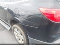 2011 Chevrolet Traverse — photo 6 of 11 | VIN 1GNKRGED0BJ334388
