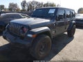 2018 Jeep Wrangler Unlimited — photo 2 of 16 | VIN 1C4HJXDG8JW271838