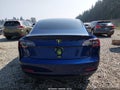 2021 Tesla Model 3 — photo 16 of 20 | VIN 5YJ3E1EB9MF876877