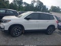2022 Honda Passport — photo 14 of 16 | VIN 5FNYF8H05NB006910