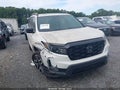 2022 Honda Passport — photo 1 of 16 | VIN 5FNYF8H05NB006910