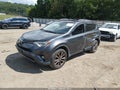 2018 Toyota RAV4 — photo 2 of 17 | VIN JTMYFREV3JJ176689