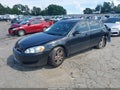 2014 Chevrolet Impala Limited — photo 2 of 15 | VIN 2G1WB5E31E1107728