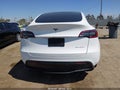 2023 Tesla Model Y — photo 15 of 15 | VIN 7SAYGDEE2PF669573