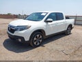 2017 Honda Ridgeline — photo 2 of 16 | VIN 5FPYK2F68HB011093