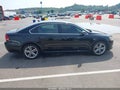 2015 Volkswagen Passat — photo 13 of 16 | VIN 1VWBV7A32FC029273