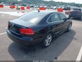 2015 Volkswagen Passat — photo 4 of 16 | VIN 1VWBV7A32FC029273