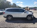 2016 Honda Pilot — photo 13 of 16 | VIN 5FNYF6H32GB059646
