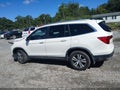 2016 Honda Pilot — photo 14 of 16 | VIN 5FNYF6H32GB059646