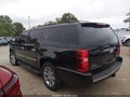 2011 Chevrolet Suburban — photo 3 of 16 | VIN 1GNSKKE37BR190306