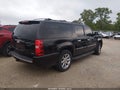2011 Chevrolet Suburban — photo 4 of 16 | VIN 1GNSKKE37BR190306
