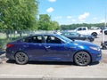 2020 Kia Optima — photo 13 of 17 | VIN 5XXGW4L29LG408002
