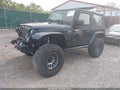 2017 Jeep Wrangler — photo 2 of 16 | VIN 1C4AJWAG3HL570455