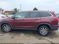 2020 Honda Pilot — photo 14 of 16 | VIN 5FNYF6H55LB054534