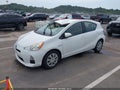 2014 Toyota Prius C — photo 2 of 16 | VIN JTDKDTB35E1562371