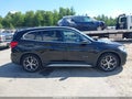 2017 BMW X1 — photo 13 of 16 | VIN WBXHT3C30H5F82641