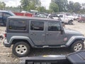 2015 Jeep Wrangler Unlimited — photo 14 of 17 | VIN 1C4BJWEG9FL647048