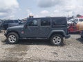2015 Jeep Wrangler Unlimited — photo 15 of 17 | VIN 1C4BJWEG9FL647048