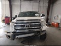 2016 Toyota Tundra — photo 11 of 15 | VIN 5TFUW5F11GX580437